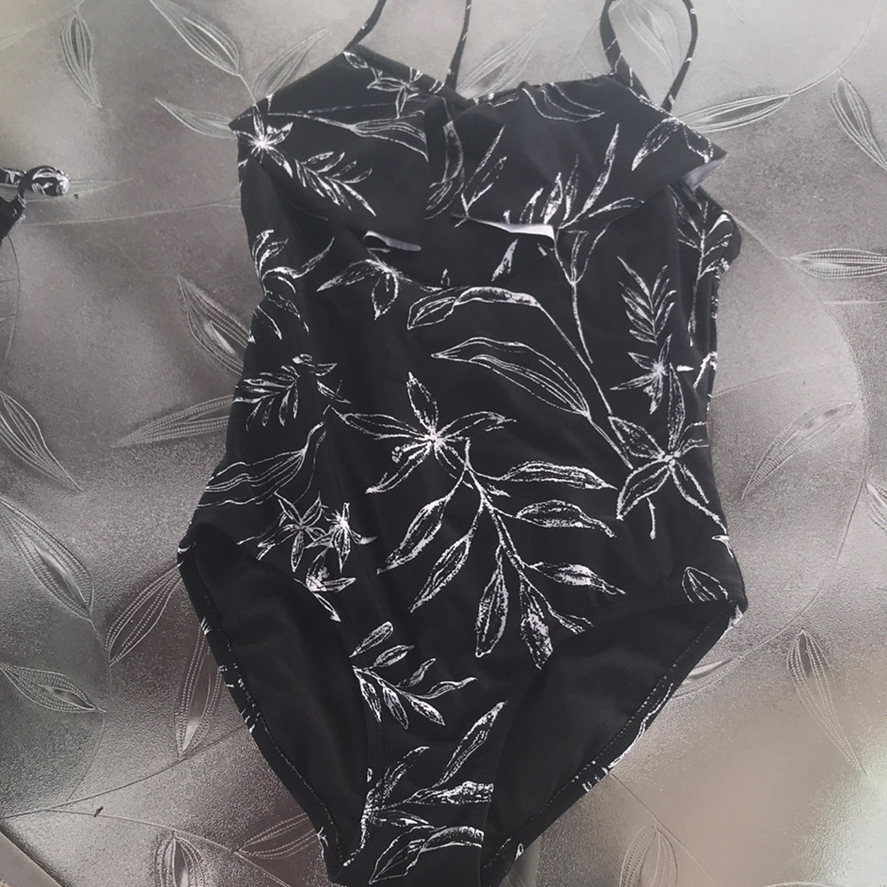 A black onesie from Old Navy. Size M (8).